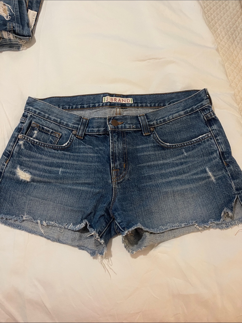 J Brand Distressed Blue Denim Cutoff Shorts